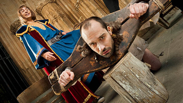 humiliation in bdsm, man in medieval stocks, bdsm degradation 