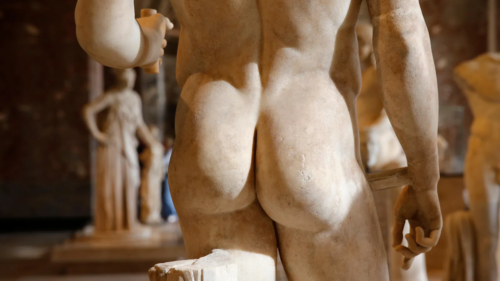 close up of statues butt, how to use anal beads safely