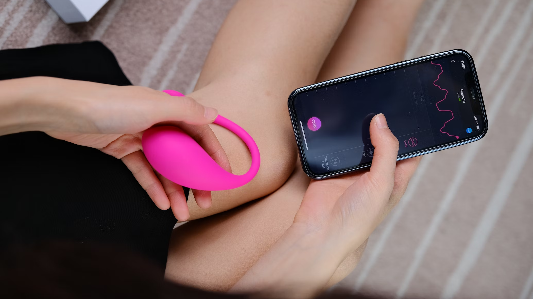 woman holding smartphone and lovense lush 3, sex toys, 