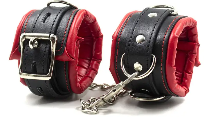 Kink gifts for adults, bondage stocking stuffers, sexy bondage gifts, handcuffs for adults, nipple clamps, vibrating nipple clamps, mini stroker, male chastity cage, panty vibrator, ball gag